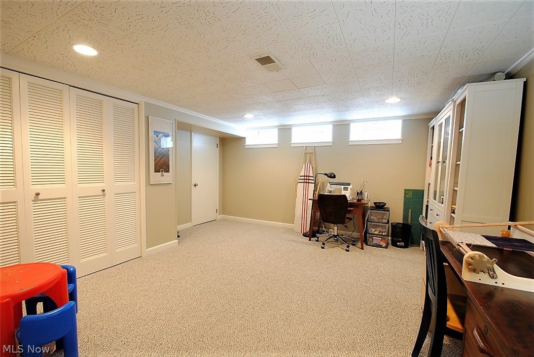 24138 Wimbledon Road Shaker Heights, OH 44122 - Photo 27 of 30 Wonderful finished basement rec room with lots of storage