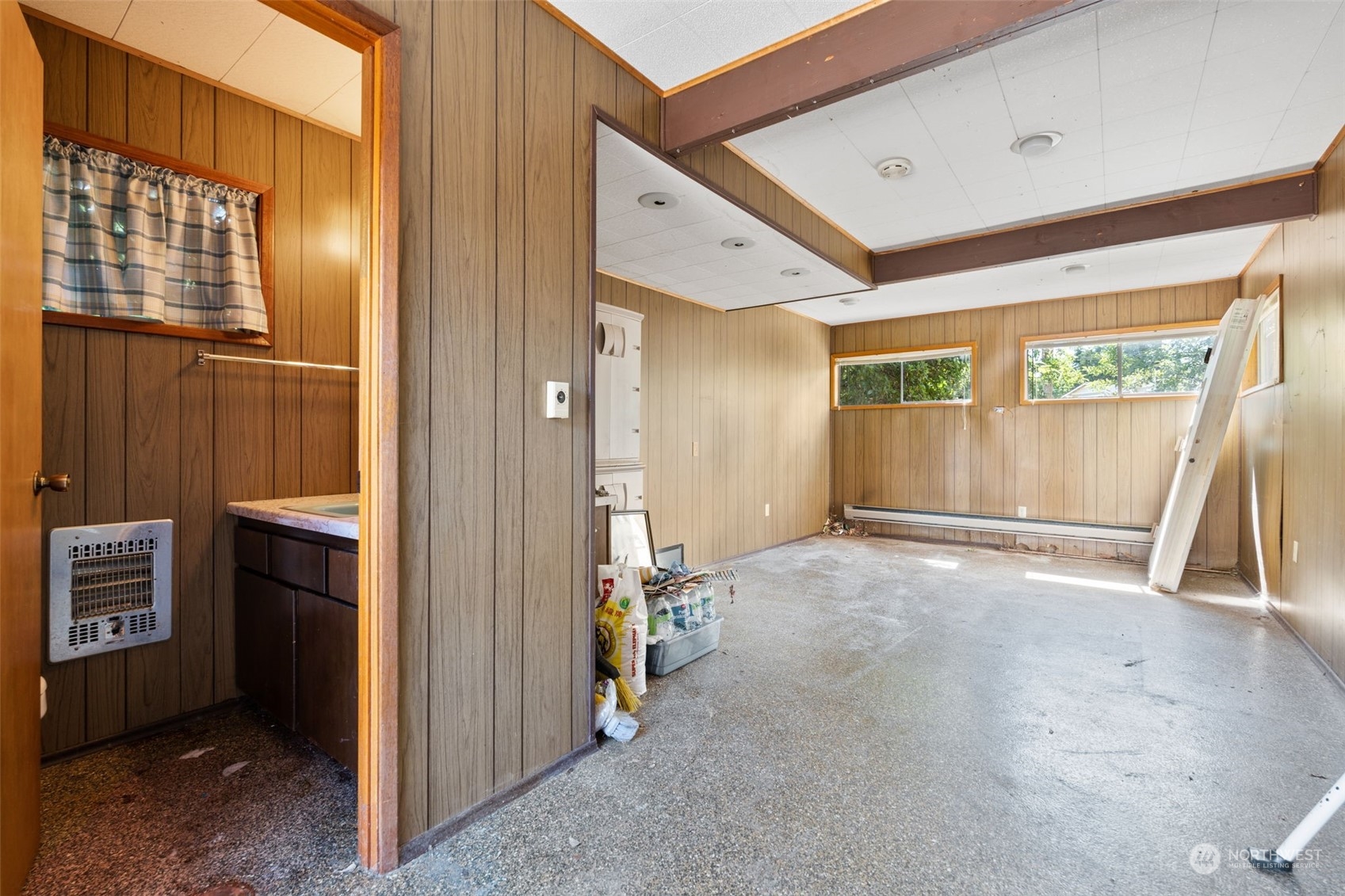 7634 South 112th Street Seattle, WA 98178 - Photo 16 of 26 a view of an empty room with a fireplace