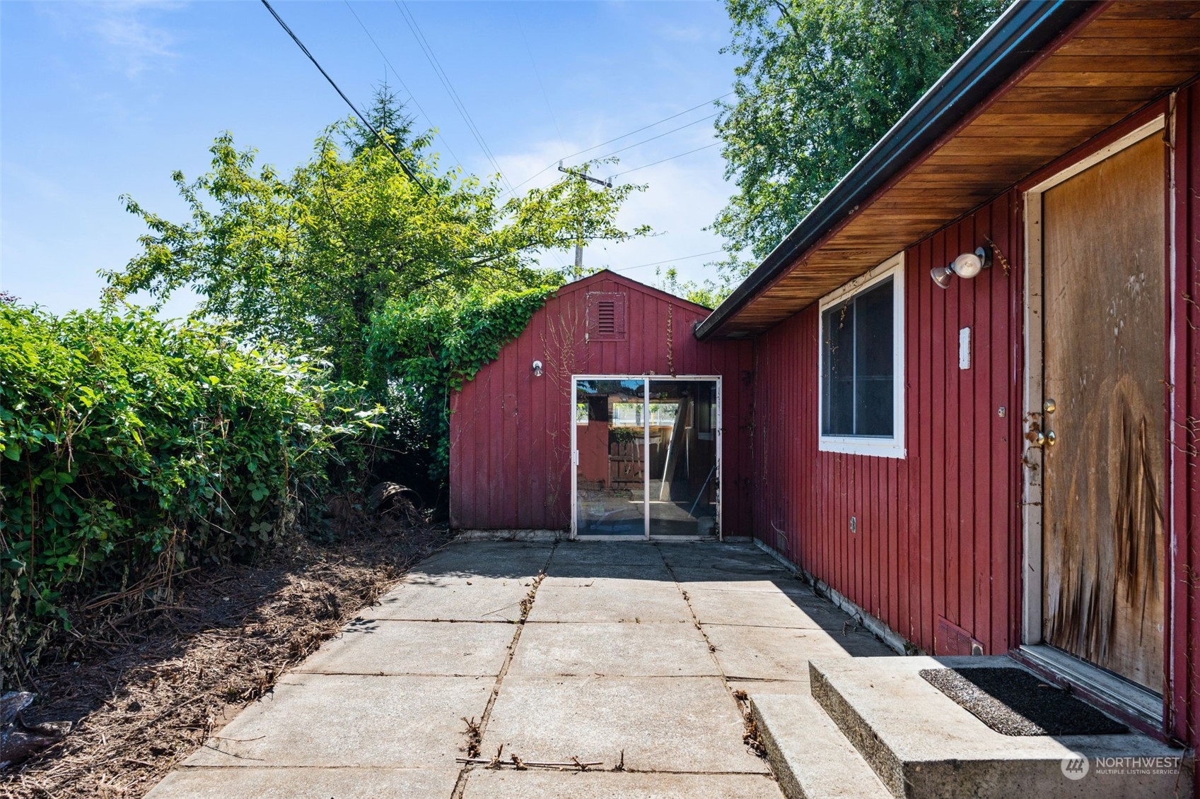 7634 South 112th Street Seattle, WA 98178 - Photo 18 of 26 a view of a house with a yard