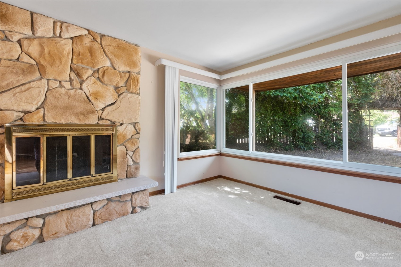 7634 South 112th Street Seattle, WA 98178 - Photo 7 of 26 a view of an empty room with a window