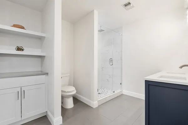 a view of bathroom with a sink and a toilet