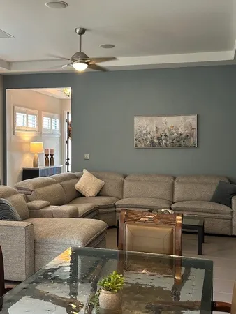 a living room with furniture and a couch