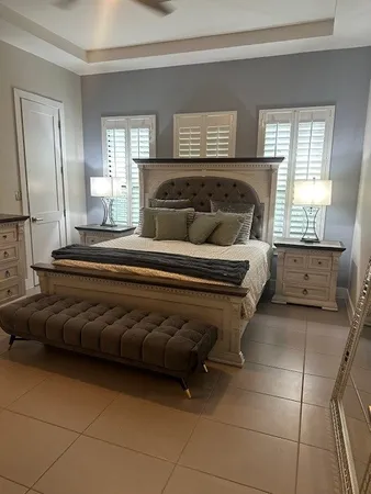 a living room with a couch and a stove top oven