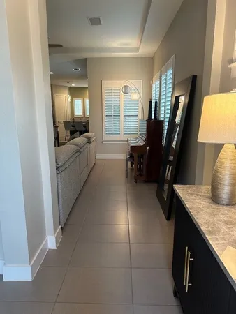 a kitchen with a sink a counter top space and appliances