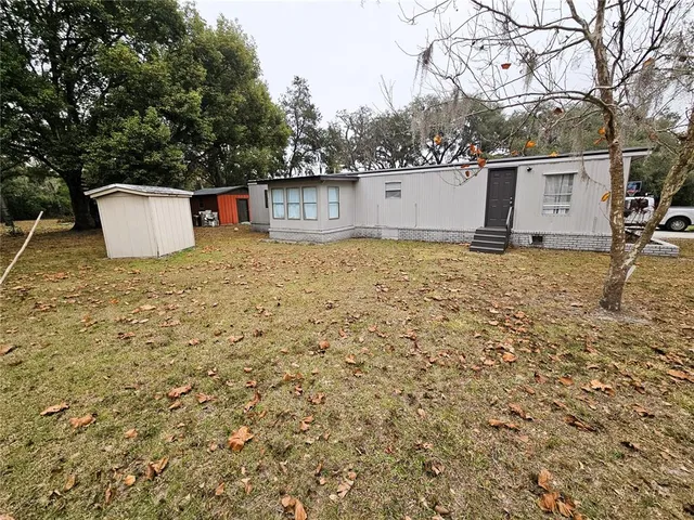 a view of a outdoor space with a tree