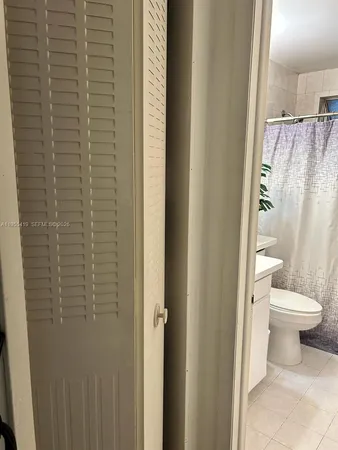 a bathroom with a sink and a toilet