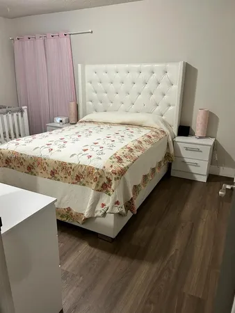 a kitchen with stainless steel appliances a sink a stove and microwave