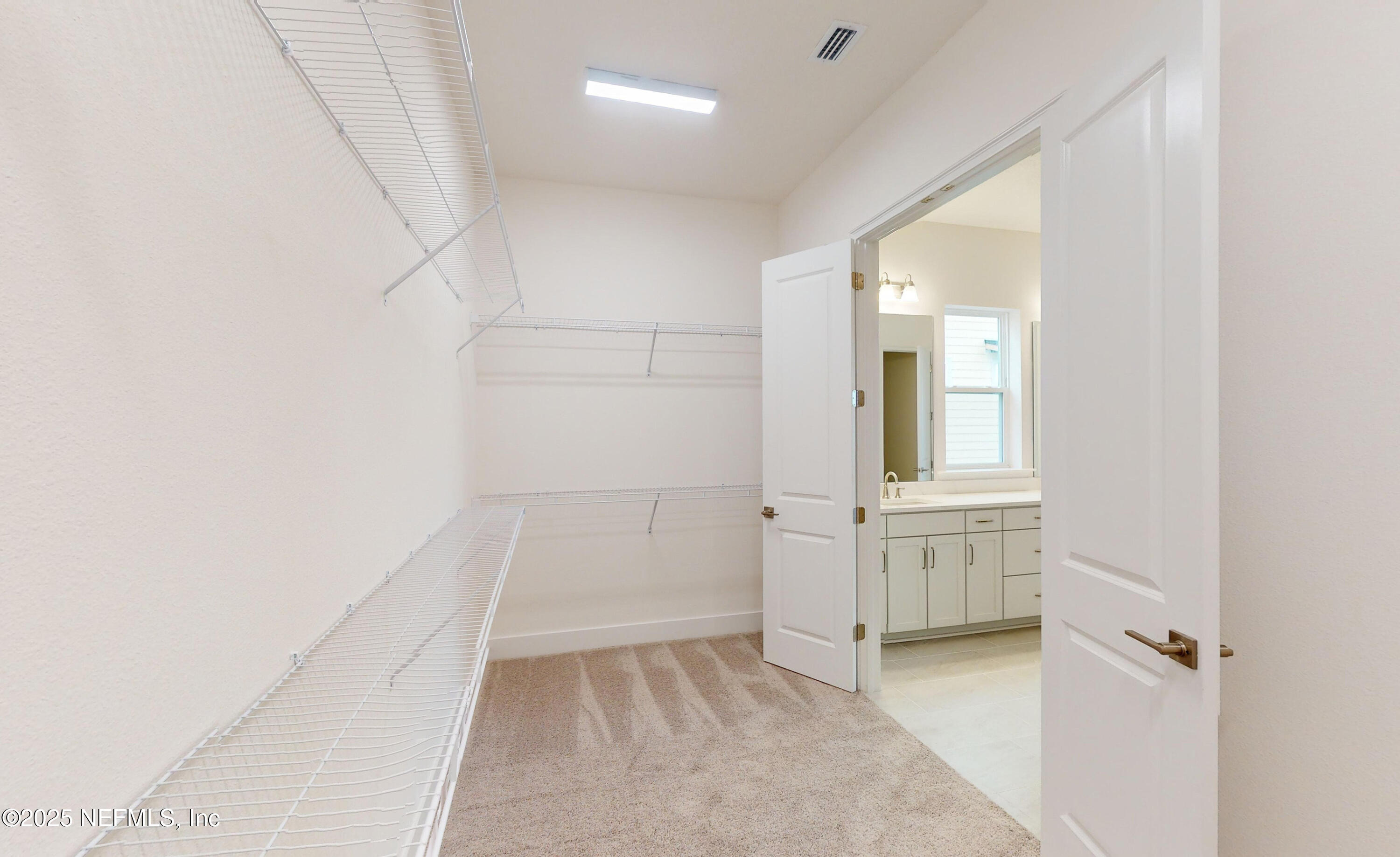 5541 Rainbarrel Road Jacksonville, FL 32224 - Photo 14 of 23 wooden floor in an empty room