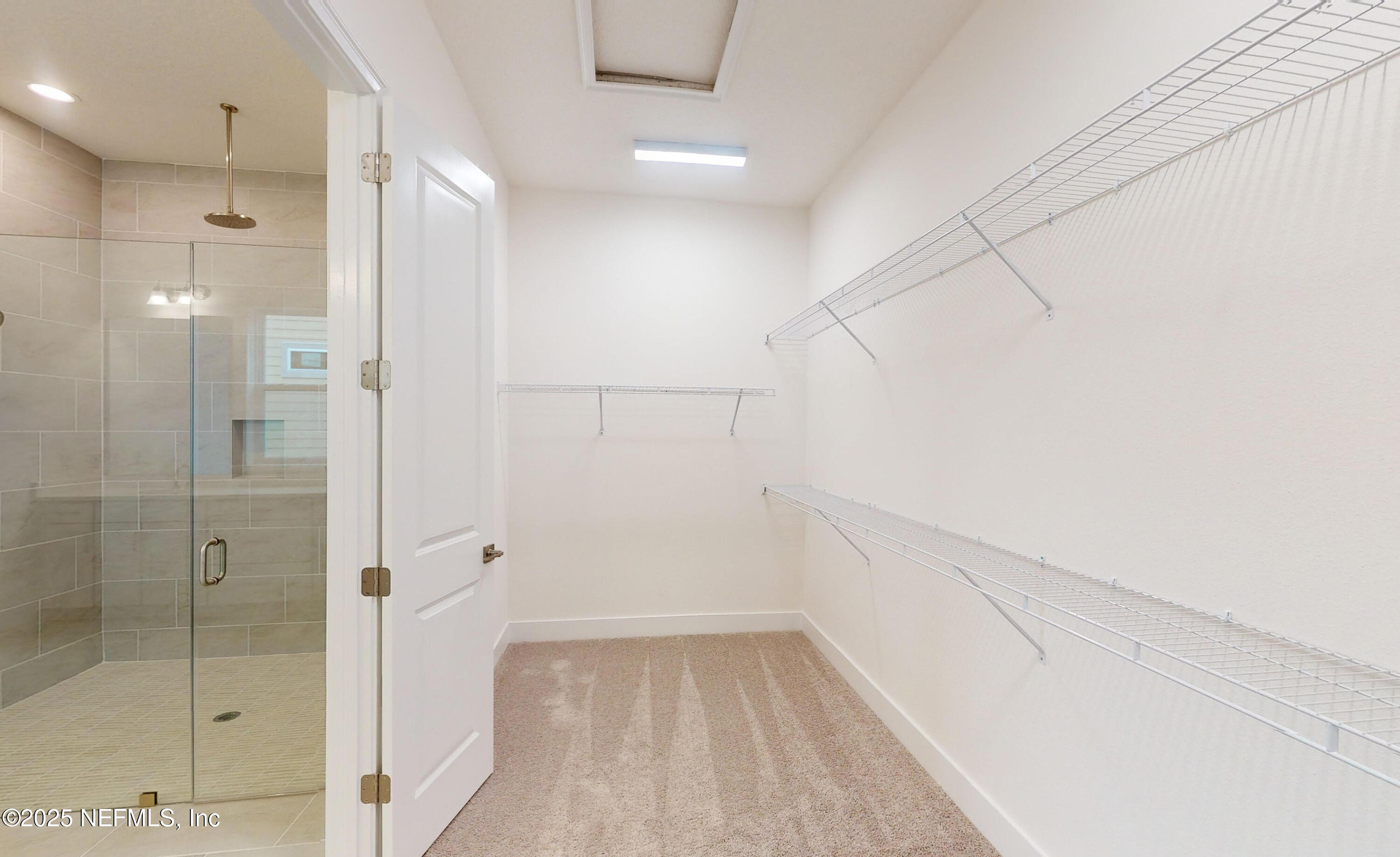 5541 Rainbarrel Road Jacksonville, FL 32224 - Photo 15 of 23 a bathroom with a bathtub and shower