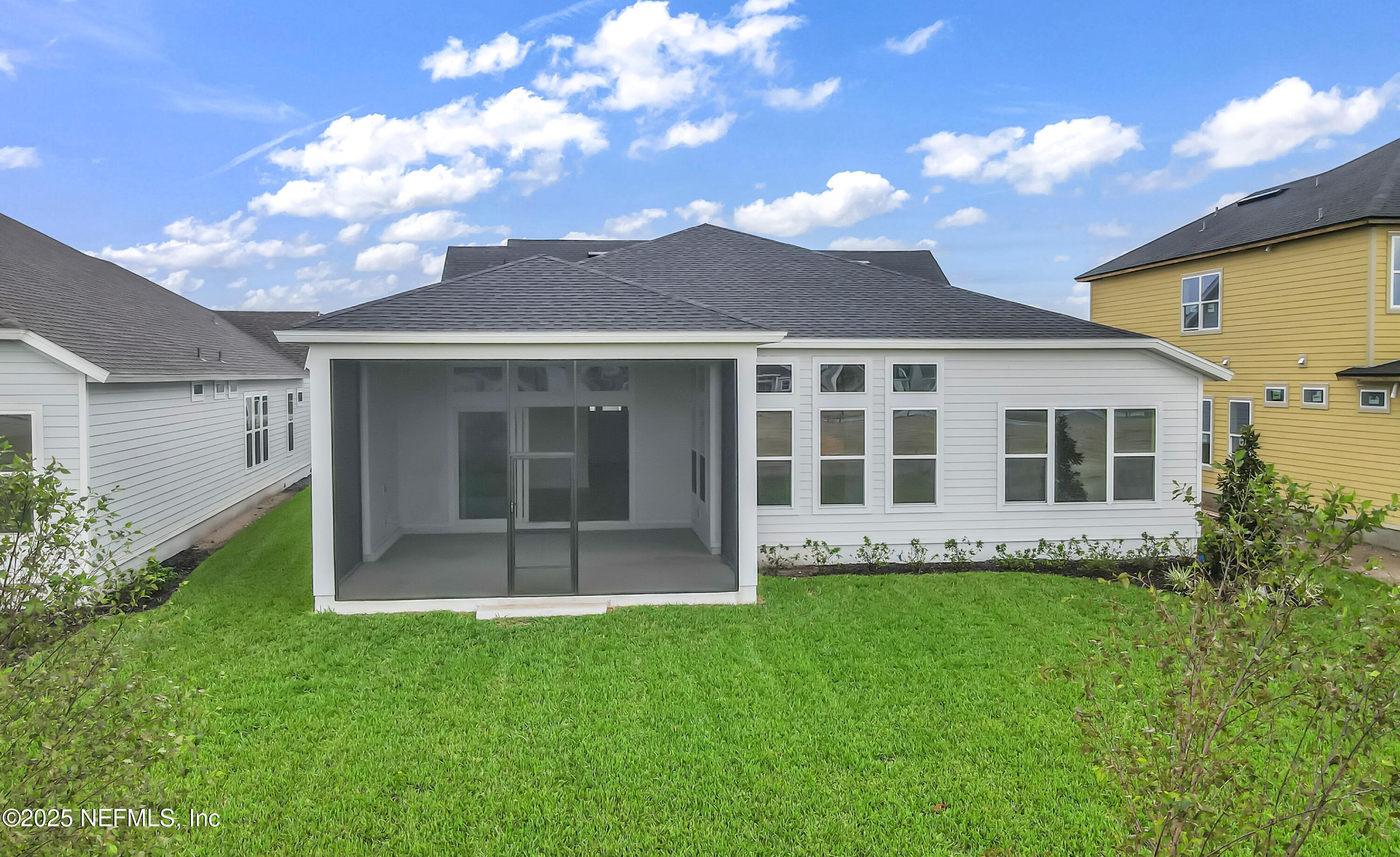 5541 Rainbarrel Road Jacksonville, FL 32224 - Photo 2 of 23 a view of a house with a garden