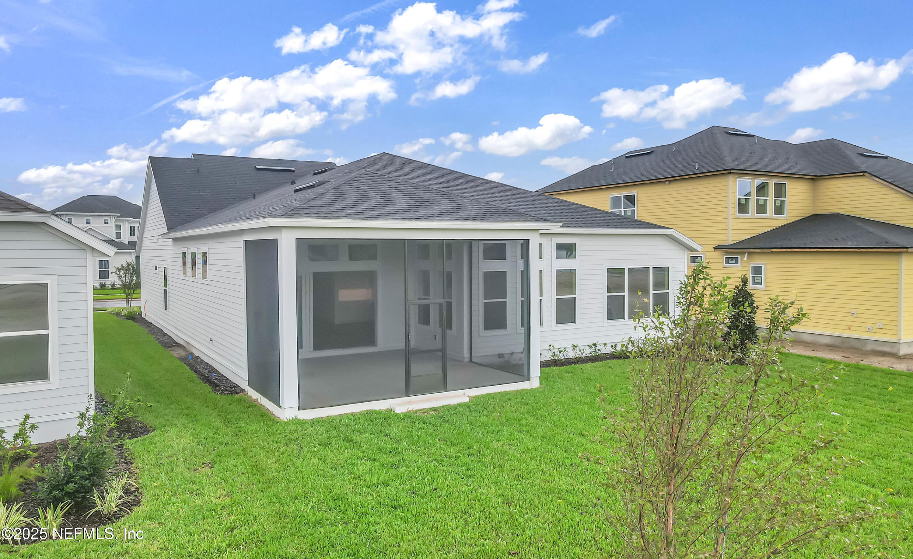 5541 Rainbarrel Road Jacksonville, FL 32224 - Photo 3 of 23 a front view of a house with a yard