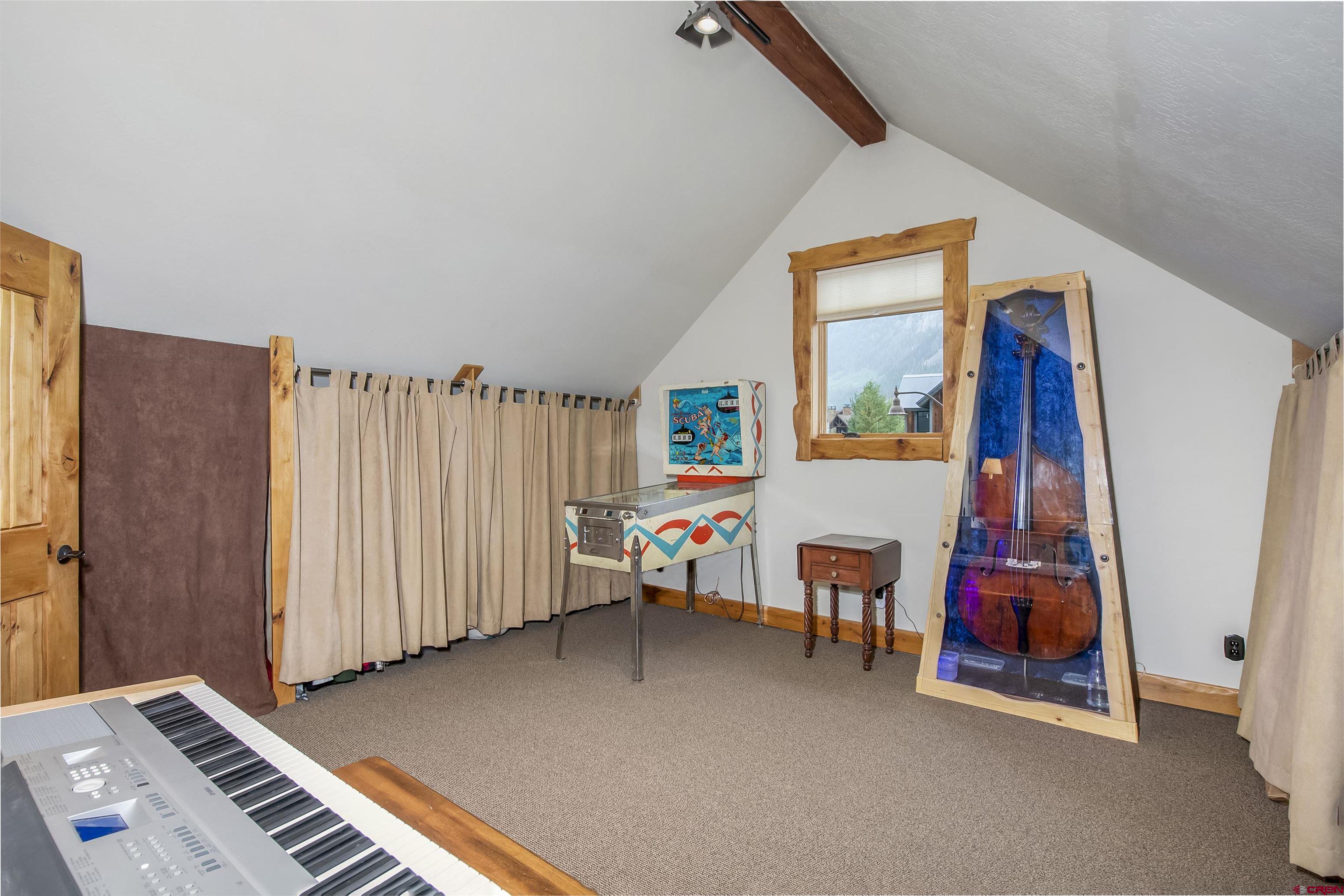 262 Larkspur Loop Crested Butte, CO 81224 - Photo 16 of 45 a view of game room with toys