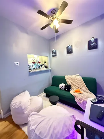 a bedroom with bed and window