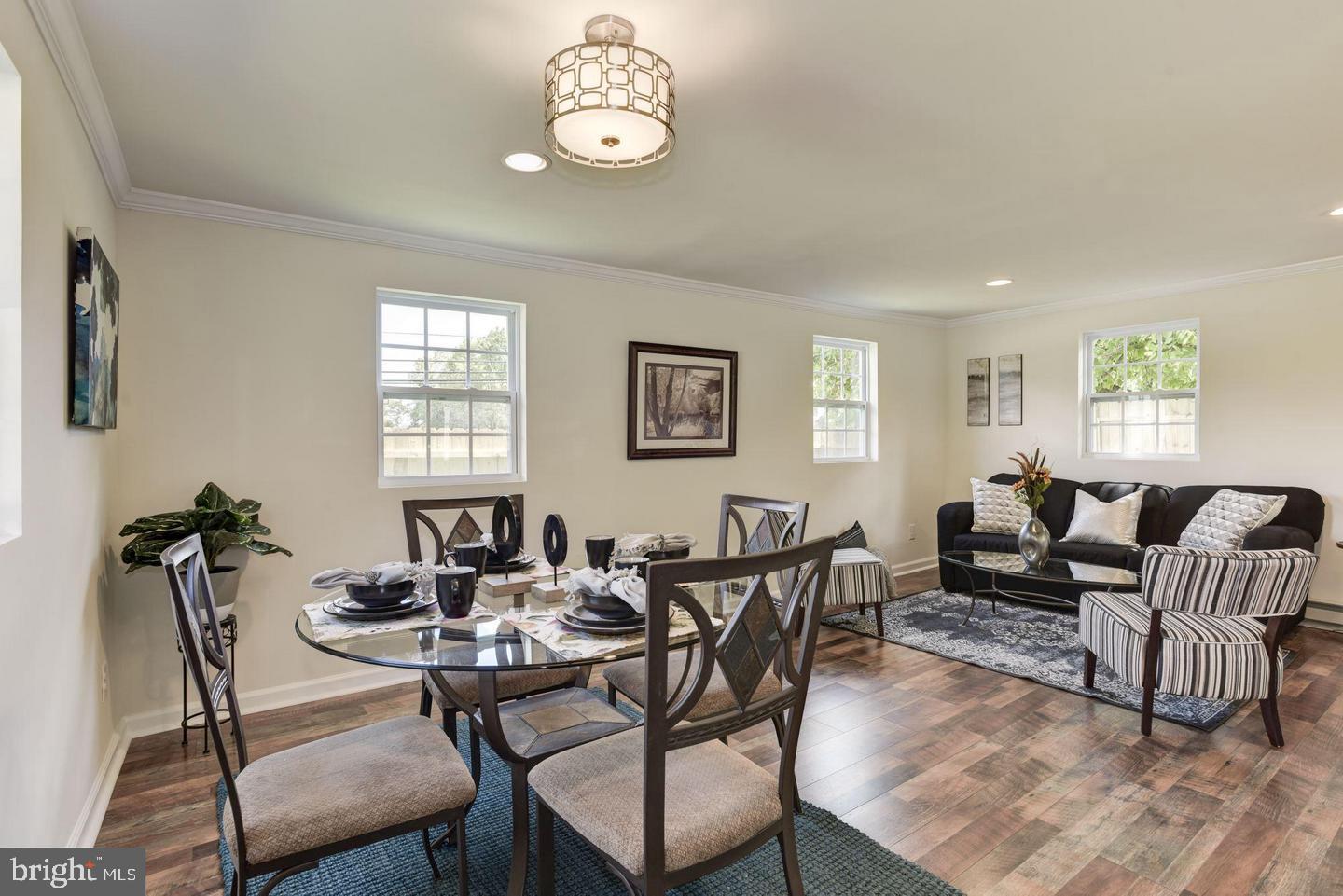 2440 Millers Mill Road Glenwood, MD 21738 - Photo 15 of 25 a view of a dining room with furniture