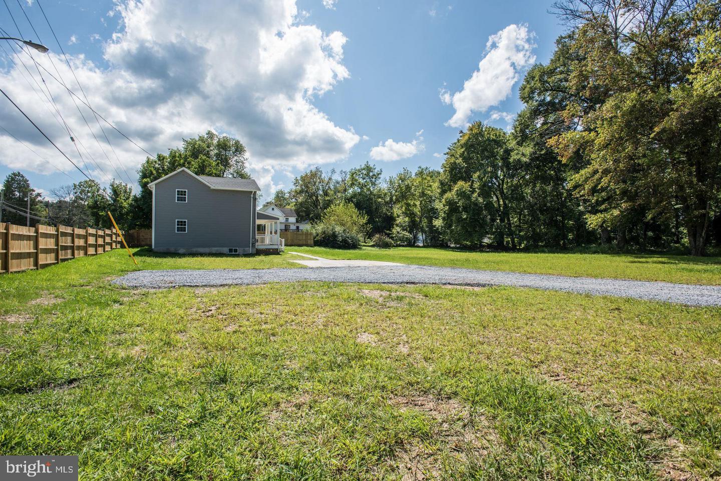 2440 Millers Mill Road Glenwood, MD 21738 - Photo 23 of 25 a view of a house with a big yard
