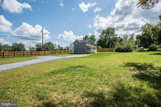 a view of a playground with basketball court