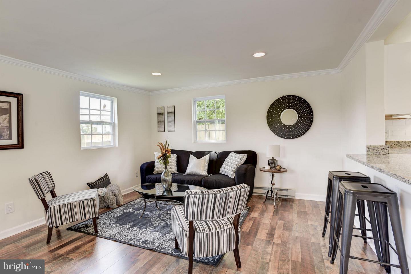 2440 Millers Mill Road Glenwood, MD 21738 - Photo 10 of 25 a living room with furniture and a large window