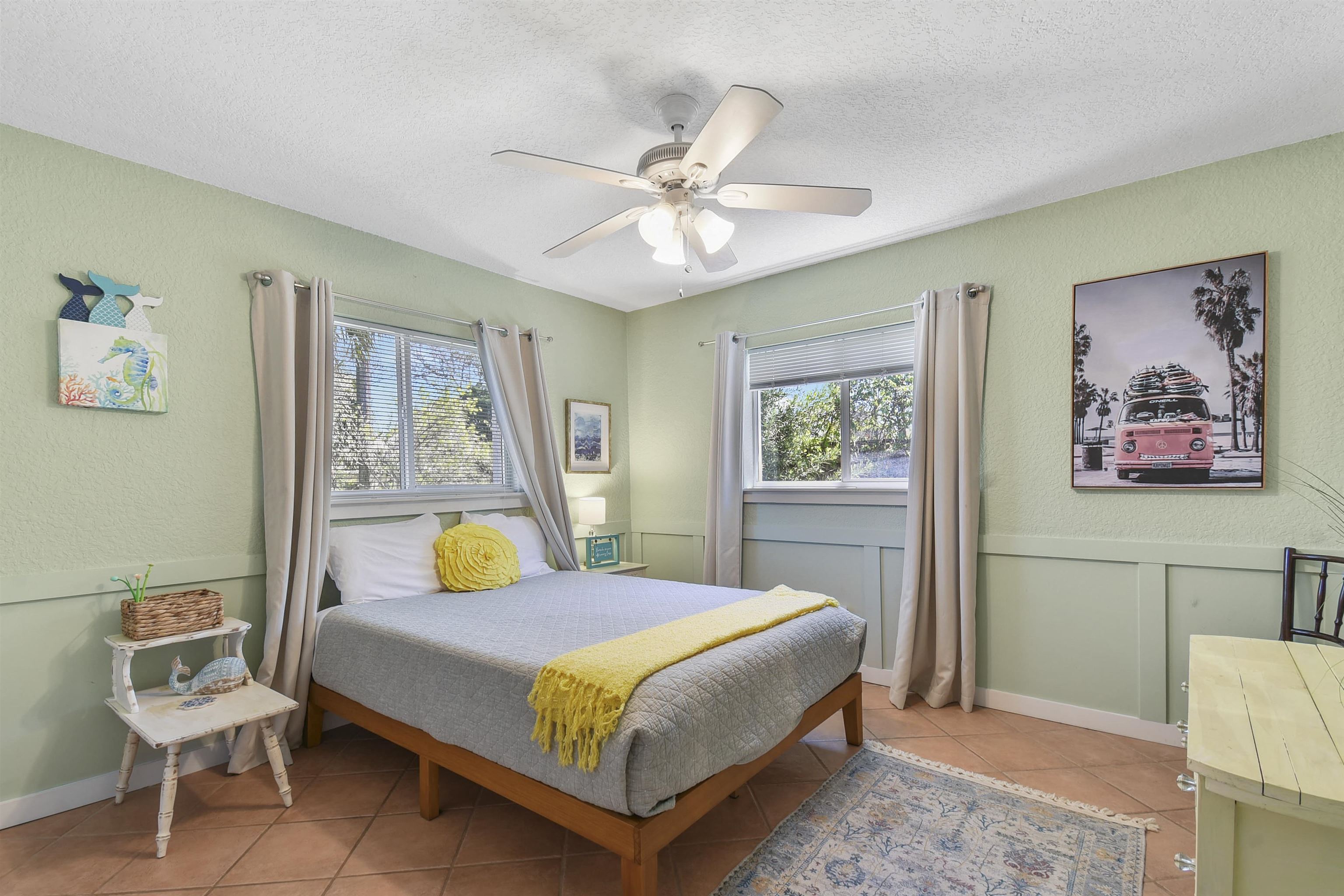 5479 2nd Street St. Augustine, FL 32080 - Photo 17 of 31 a bedroom with a bed and window