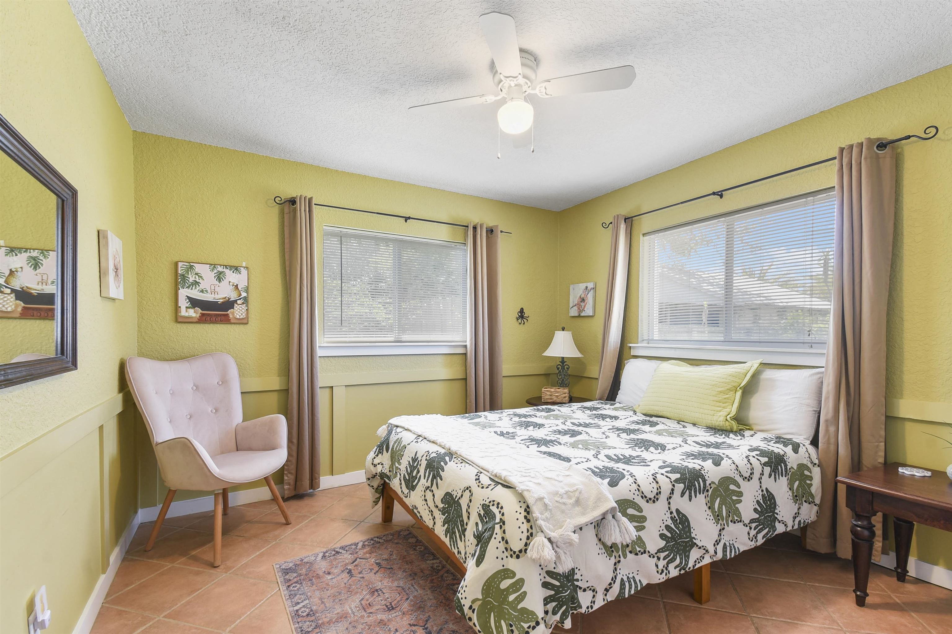 5479 2nd Street St. Augustine, FL 32080 - Photo 20 of 31 a bedroom with a bed chair and a window