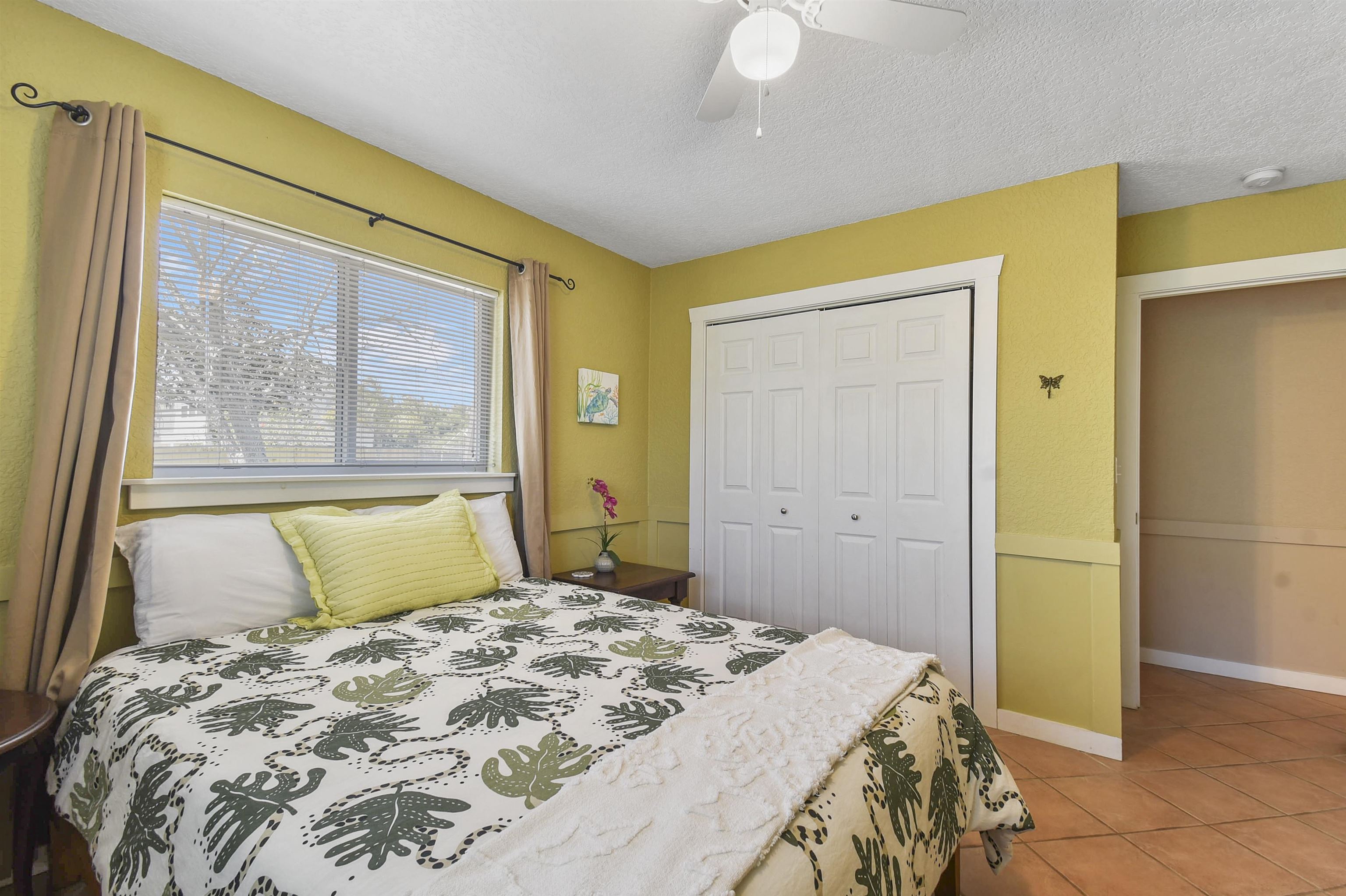 5479 2nd Street St. Augustine, FL 32080 - Photo 21 of 31 a bedroom with a bed and a window