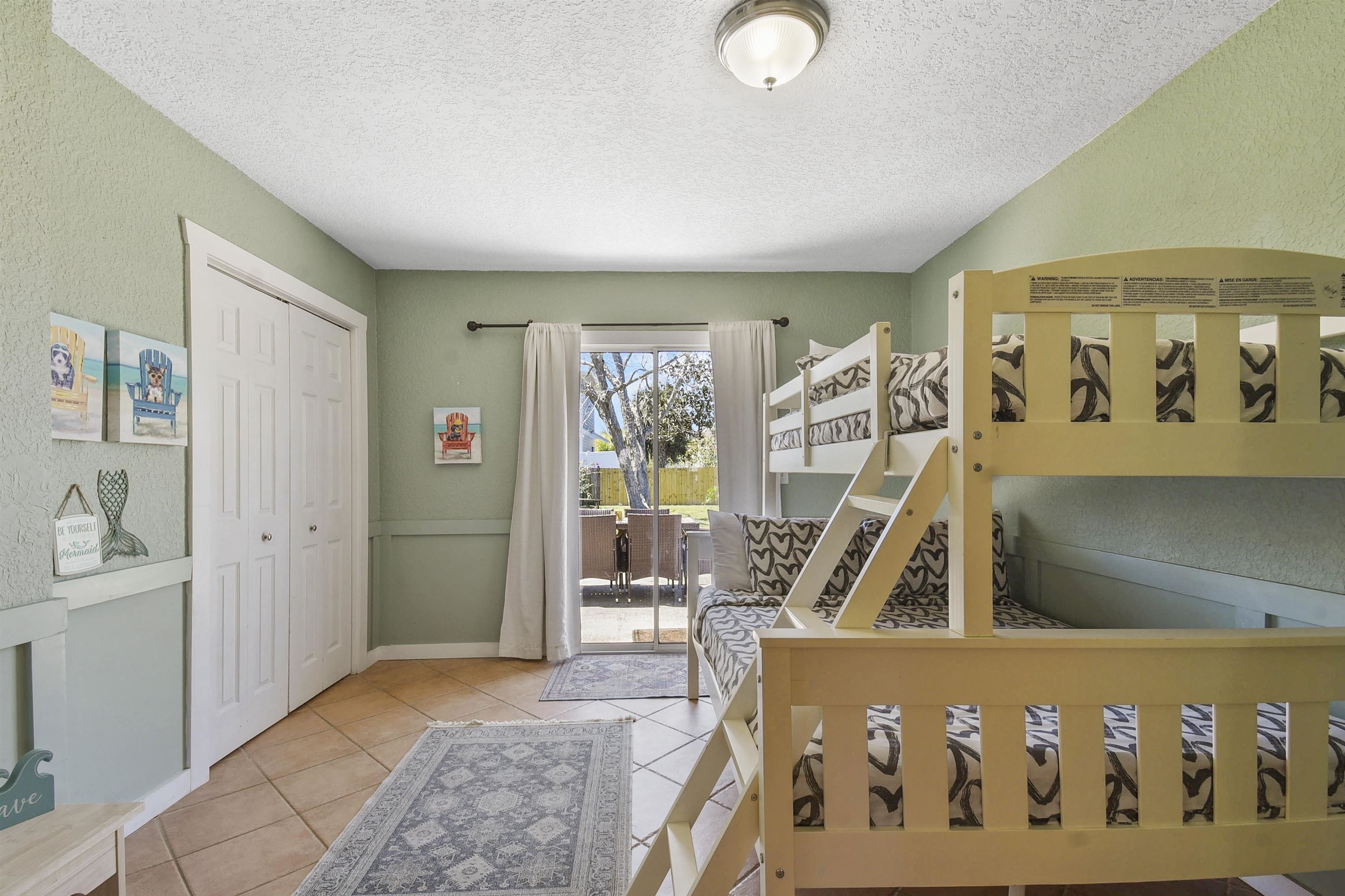 5479 2nd Street St. Augustine, FL 32080 - Photo 25 of 31 a living room with furniture and a large window