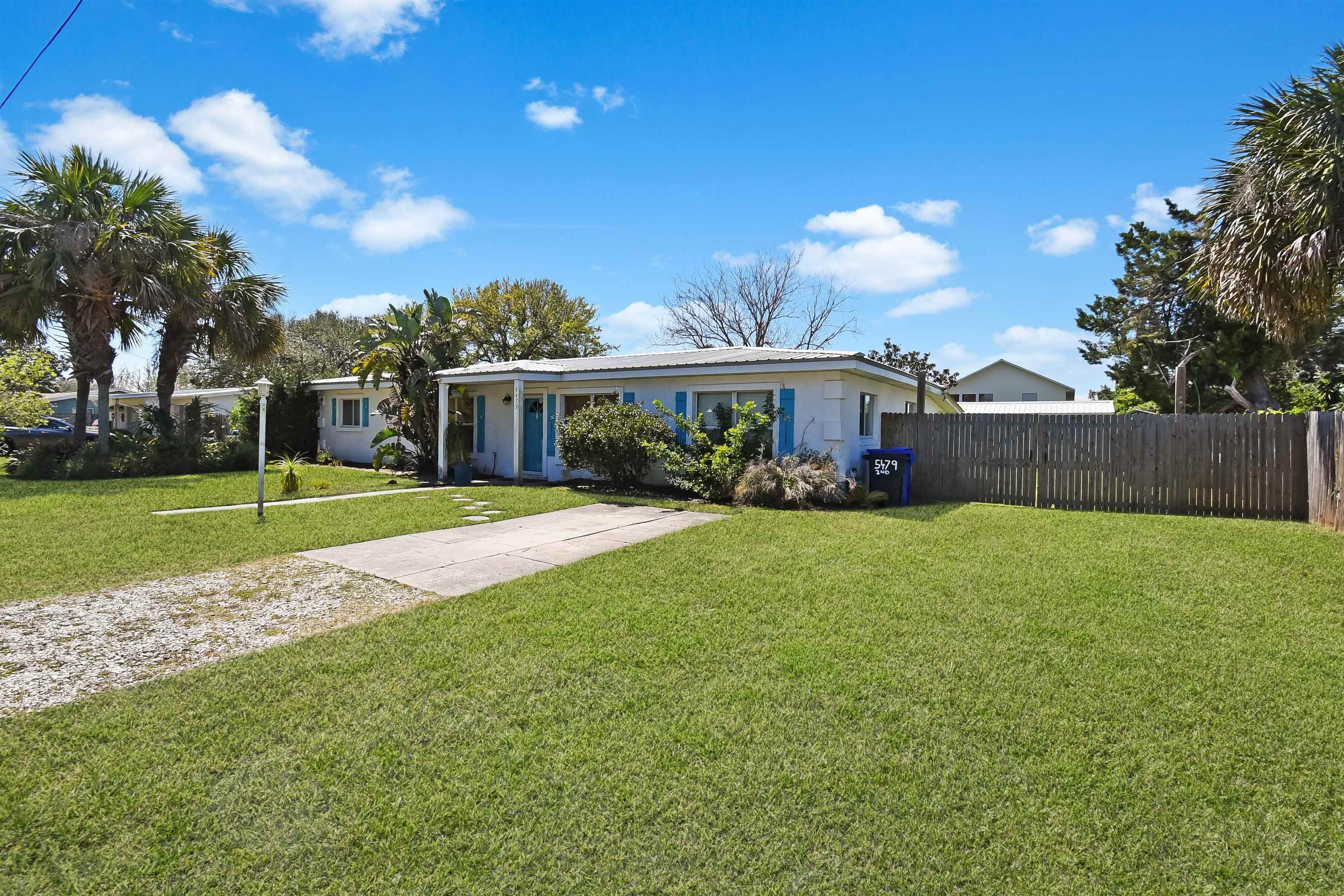 5479 2nd Street St. Augustine, FL 32080 - Photo 4 of 31 a view of a house with a big yard