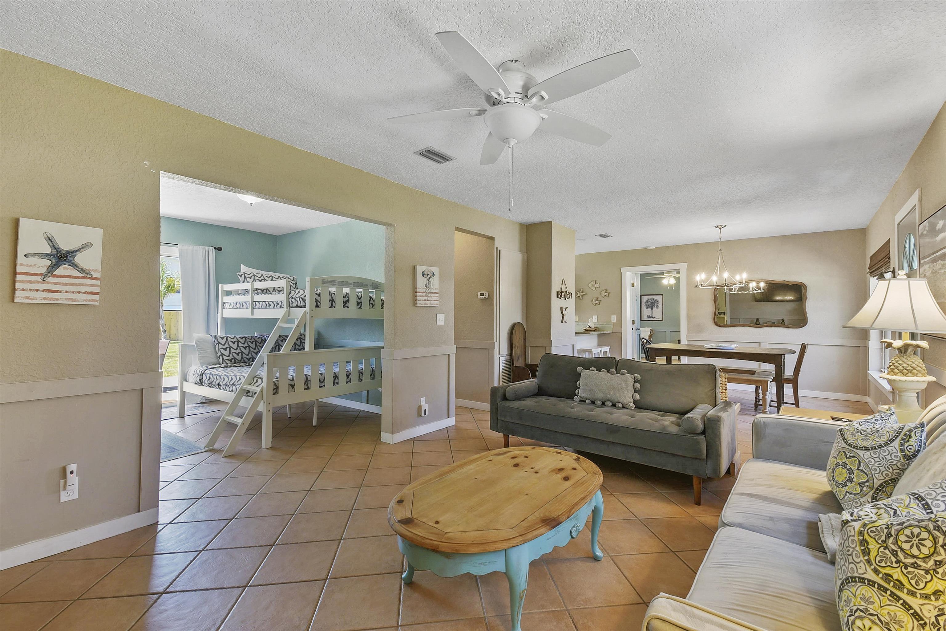 5479 2nd Street St. Augustine, FL 32080 - Photo 6 of 31 a living room with furniture and a large window