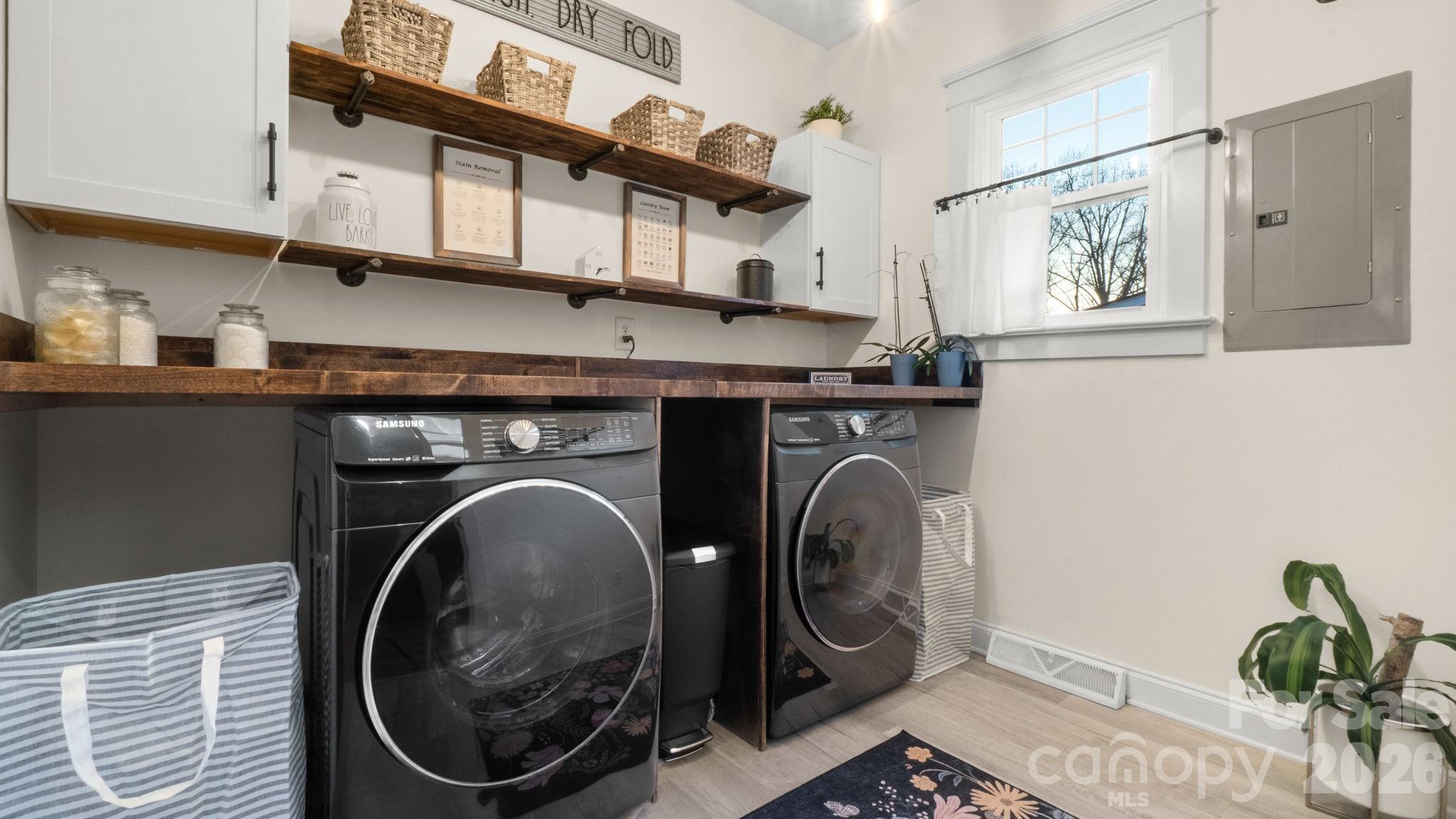 907 Derick's Crossing Fort Mill, SC 29708 - Photo 13 of 47 a utility room with dryer and washer