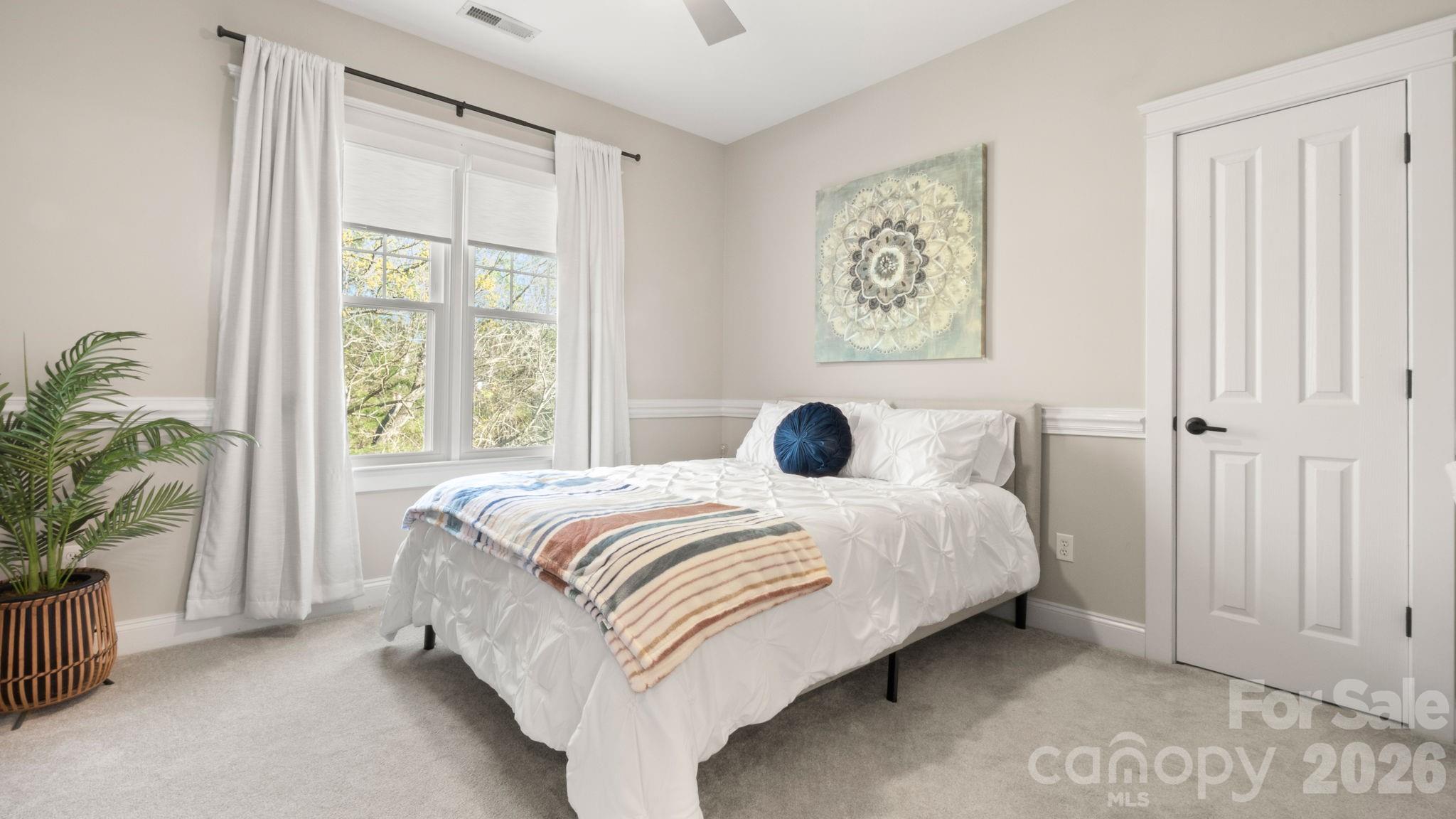 907 Derick's Crossing Fort Mill, SC 29708 - Photo 21 of 47 a bedroom with a bed and a window