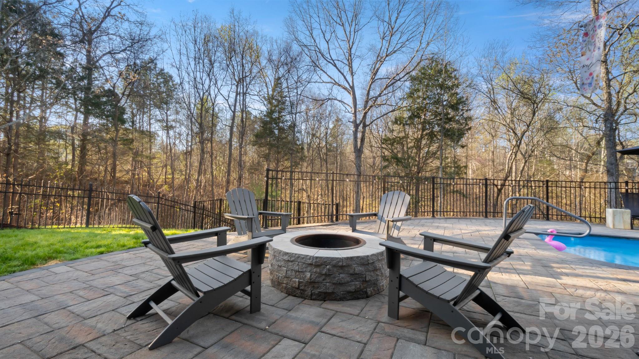 907 Derick's Crossing Fort Mill, SC 29708 - Photo 33 of 47 a view of a backyard with sitting area and furniture