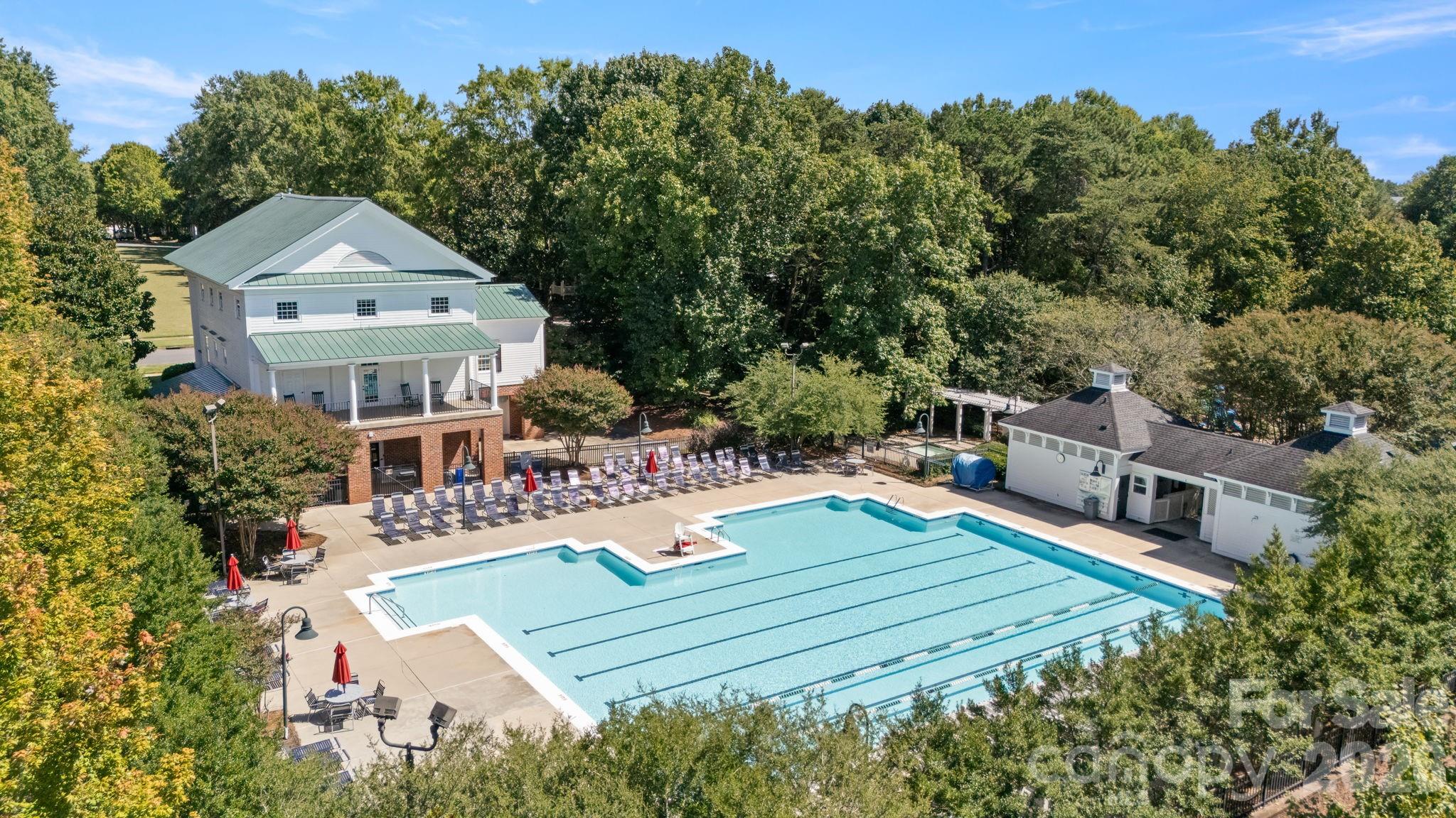 907 Derick's Crossing Fort Mill, SC 29708 - Photo 39 of 47 an aerial view of a house with swimming pool and trees