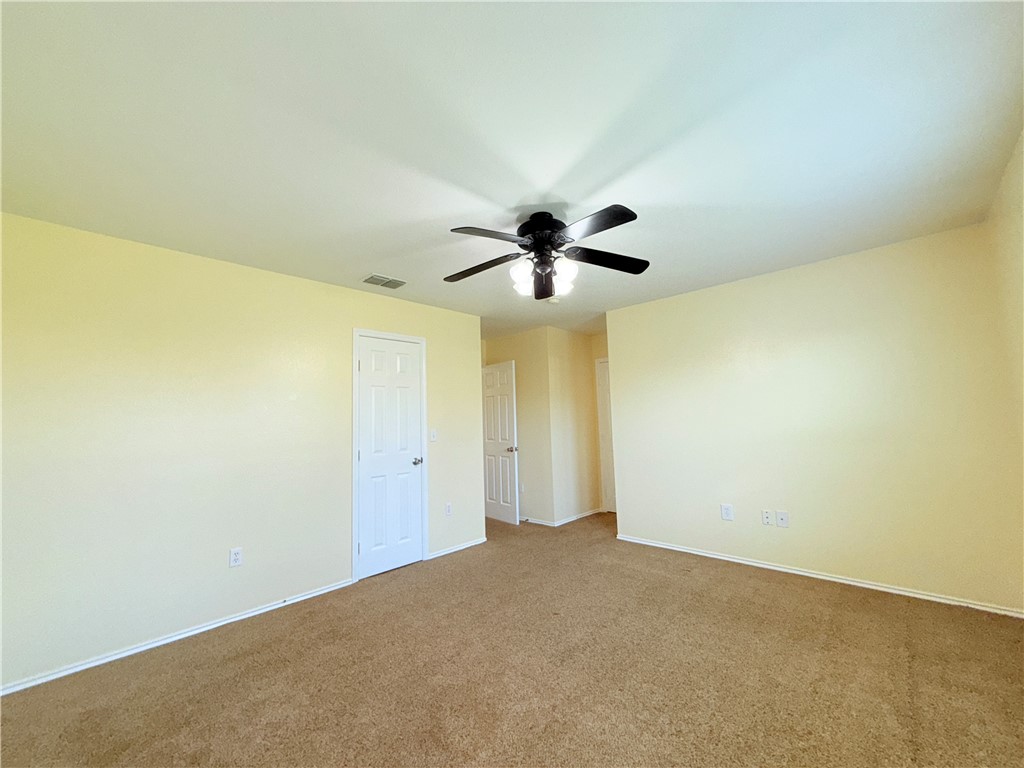 1019 Livermore Street Portland, TX 78374 - Photo 11 of 32 a view of a big room with carpet