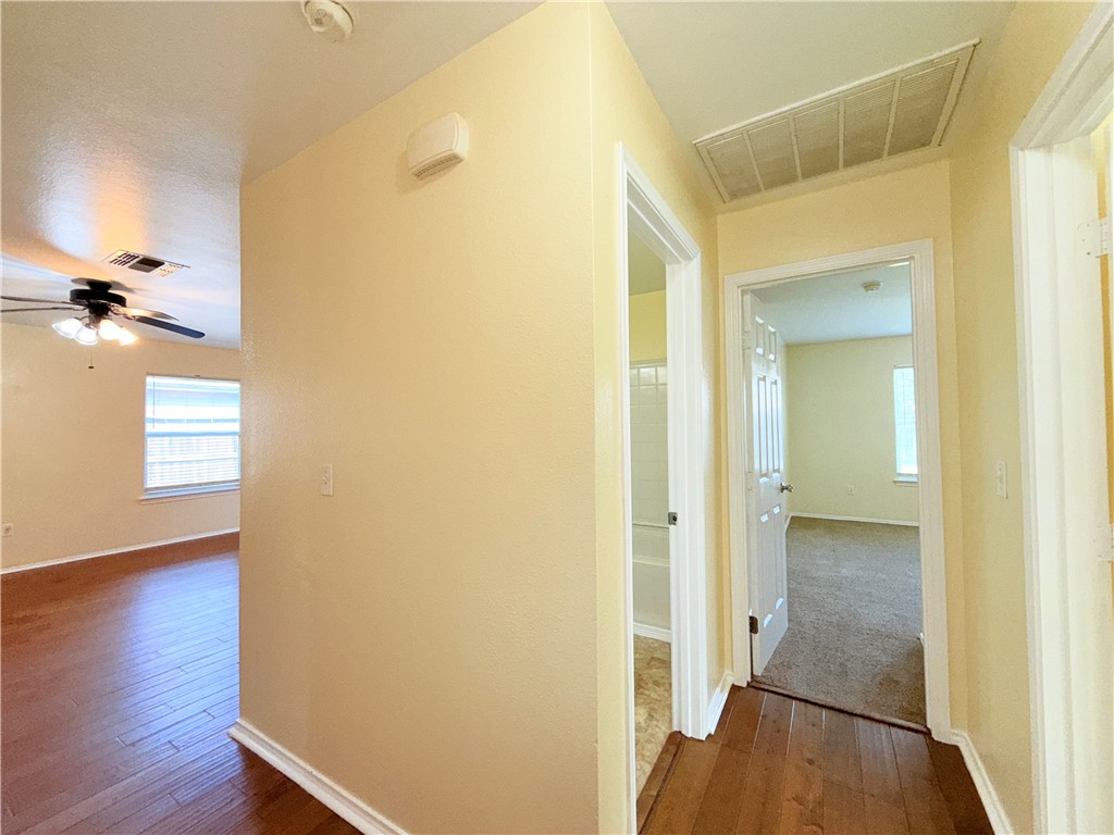 1019 Livermore Street Portland, TX 78374 - Photo 20 of 32 a view of a bathroom from a hallway