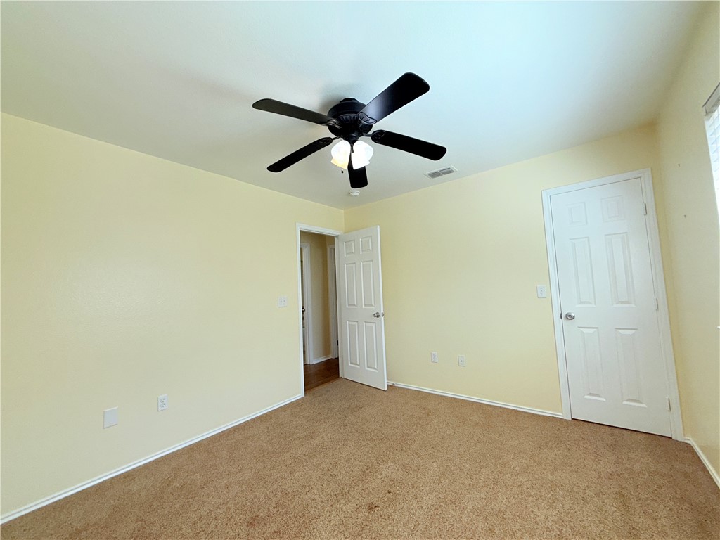1019 Livermore Street Portland, TX 78374 - Photo 22 of 32 a view of a big room with carpet