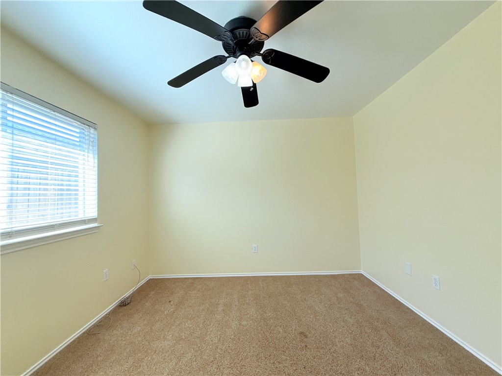 1019 Livermore Street Portland, TX 78374 - Photo 25 of 32 an empty room with a window