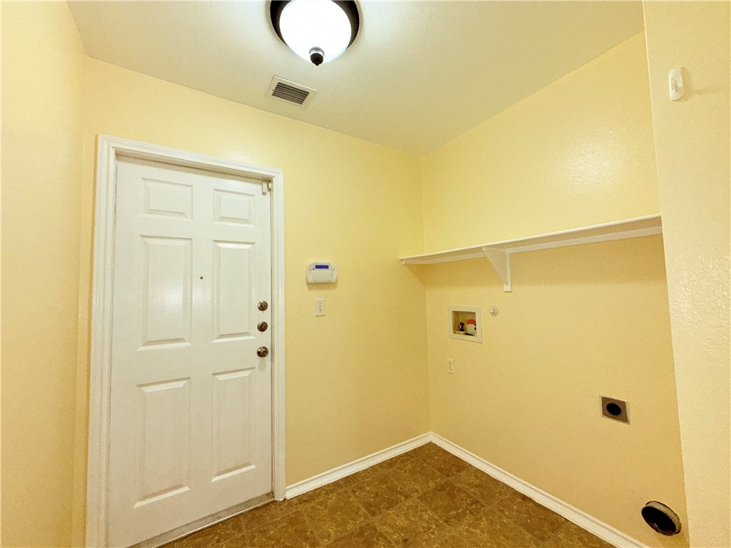 1019 Livermore Street Portland, TX 78374 - Photo 29 of 32 a bathroom with a shower