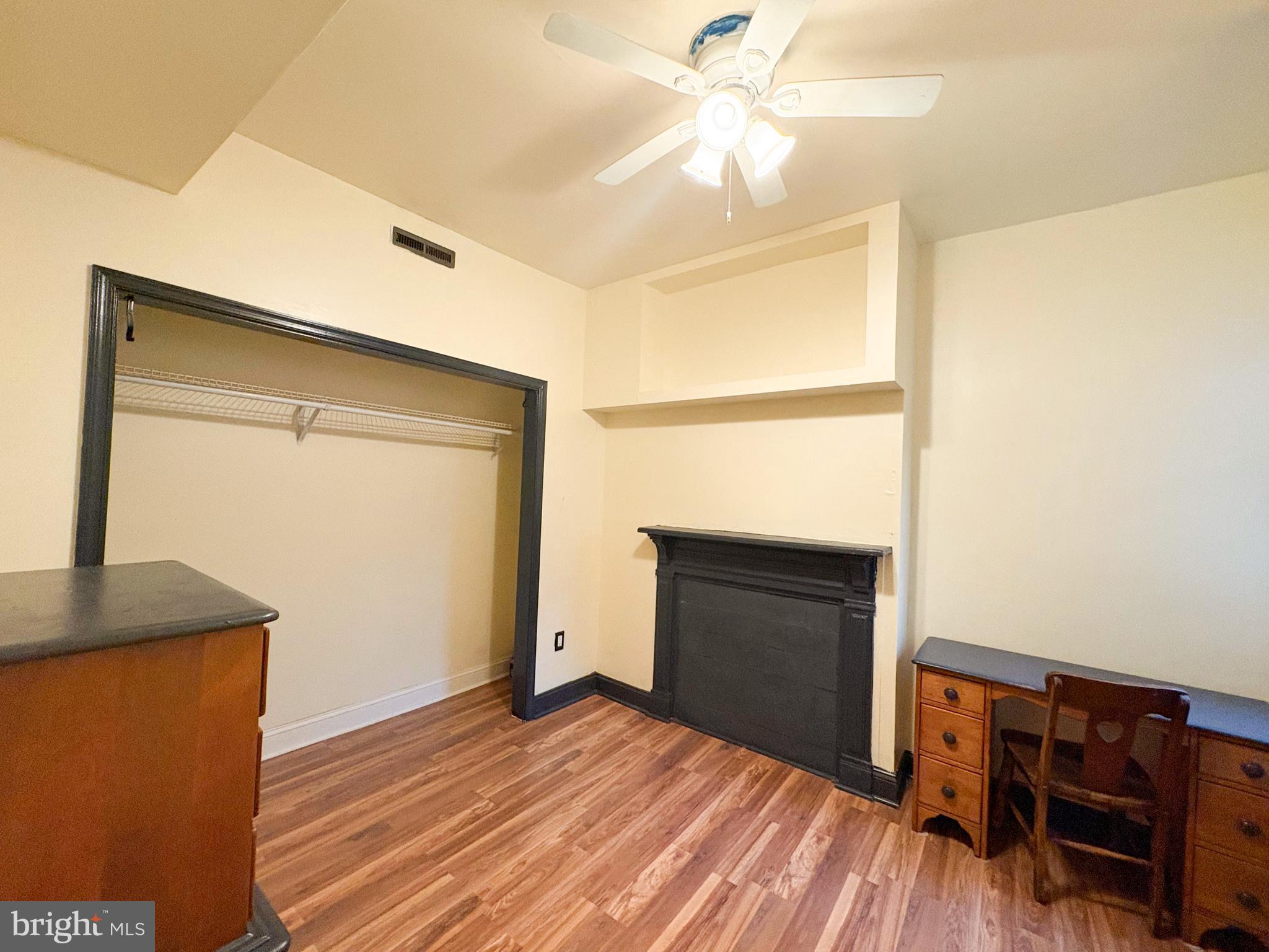 754 Dolphin Street Baltimore, MD 21217 - Photo 13 of 23 a view of empty room with wooden floor