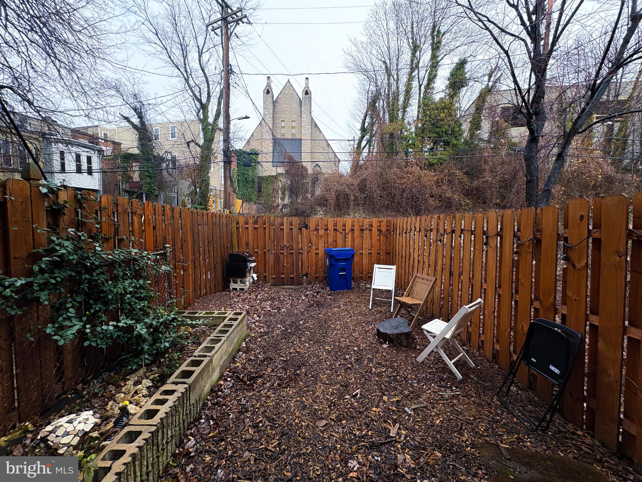 754 Dolphin Street Baltimore, MD 21217 - Photo 21 of 23 a backyard of a house with lots of green space