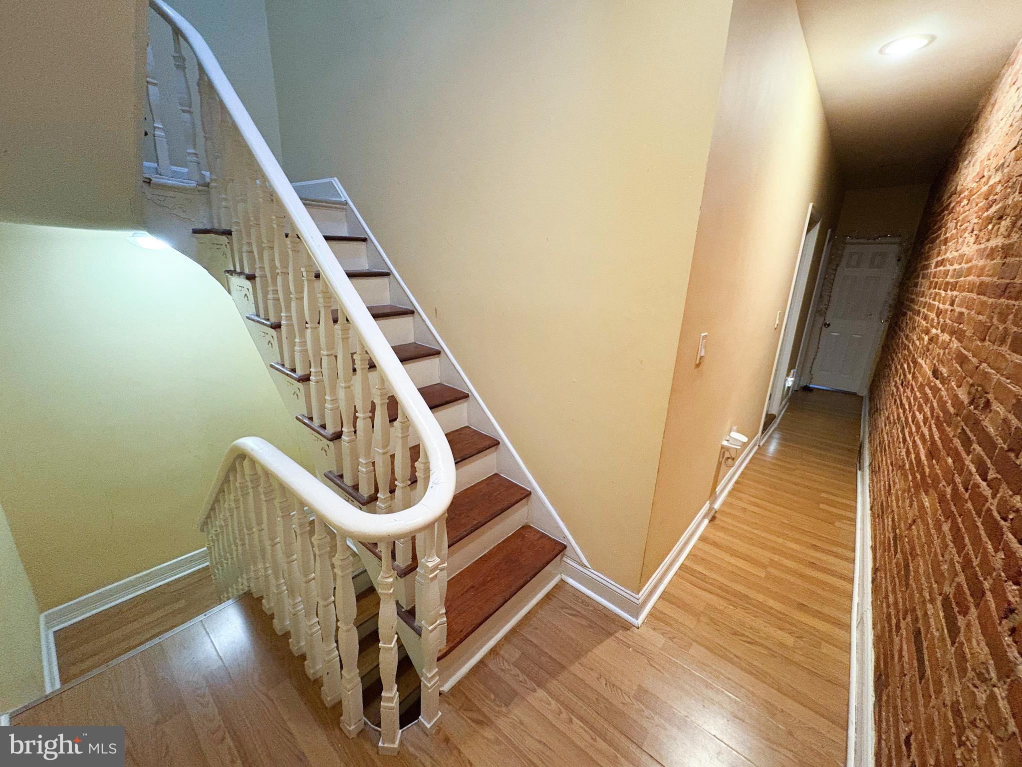 754 Dolphin Street Baltimore, MD 21217 - Photo 10 of 23 a view of an entryway with wooden floor