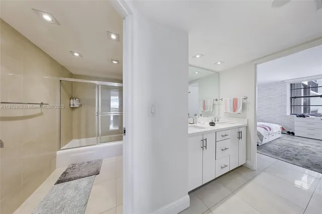 a bathroom with a shower and a toilet