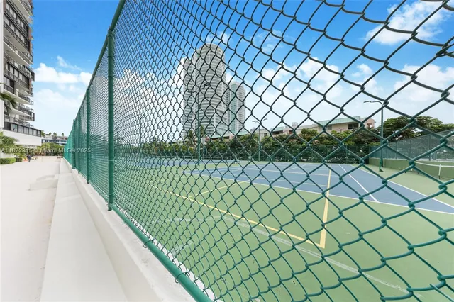 a view of a swimming pool with a lake view