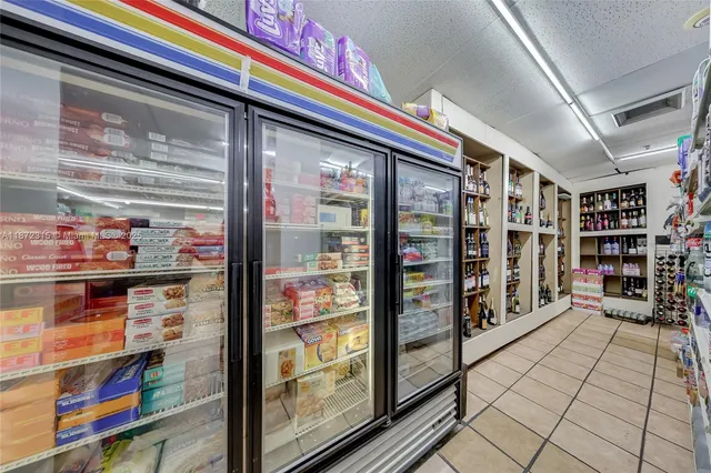a view of a kitchen and dining room