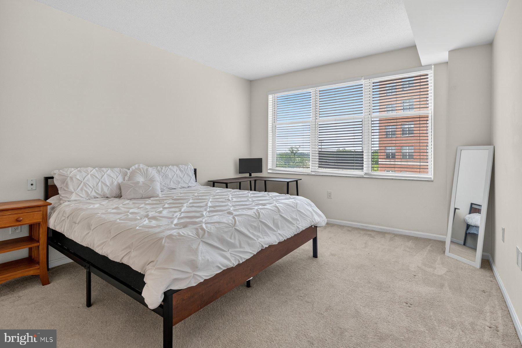 3801 Canterbury Road, Unit 403 Baltimore, MD 21218 - Photo 17 of 25 Bright and airy bedroom retreat.
