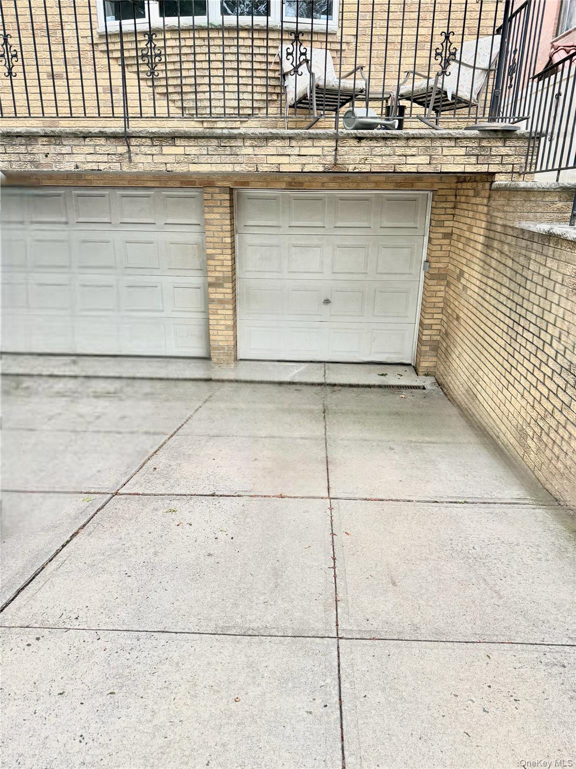 56-17 135th Street Queens, NY 11355 - Photo 8 of 8 a kitchen with a sink and cabinets