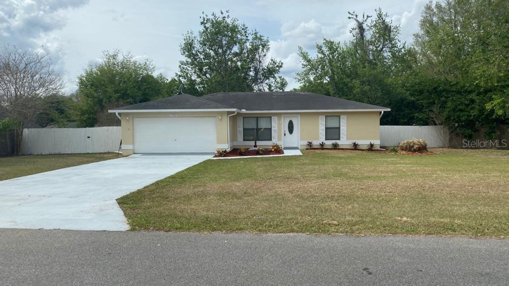 5940 Southeast 46th Avenue Road Ocala, FL 34480 - Photo 1 of 1 a view of a house with a outdoor space
