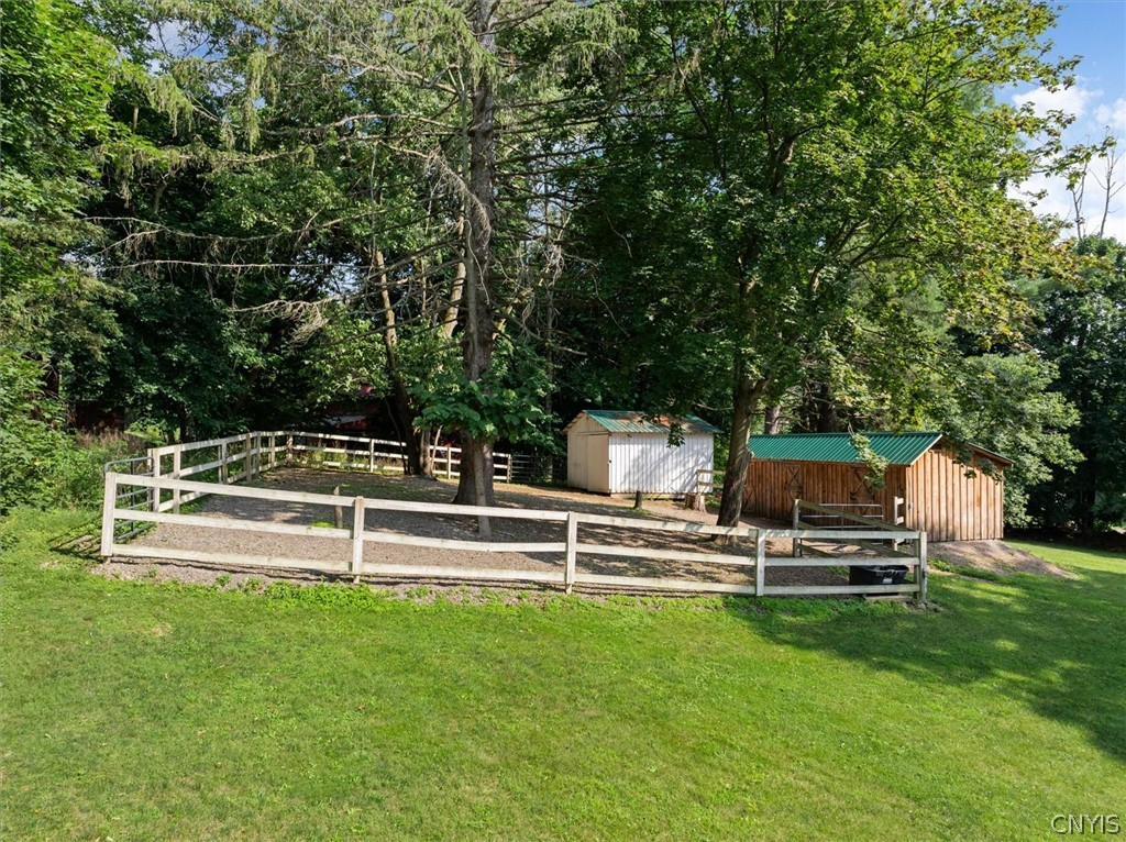 52 East State Street Sherburne, NY 13460 - Photo 6 of 50 A two stall barn, hay barn and paddock for horses!