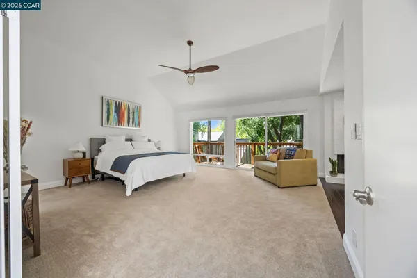 a bed room with a bed and a couch