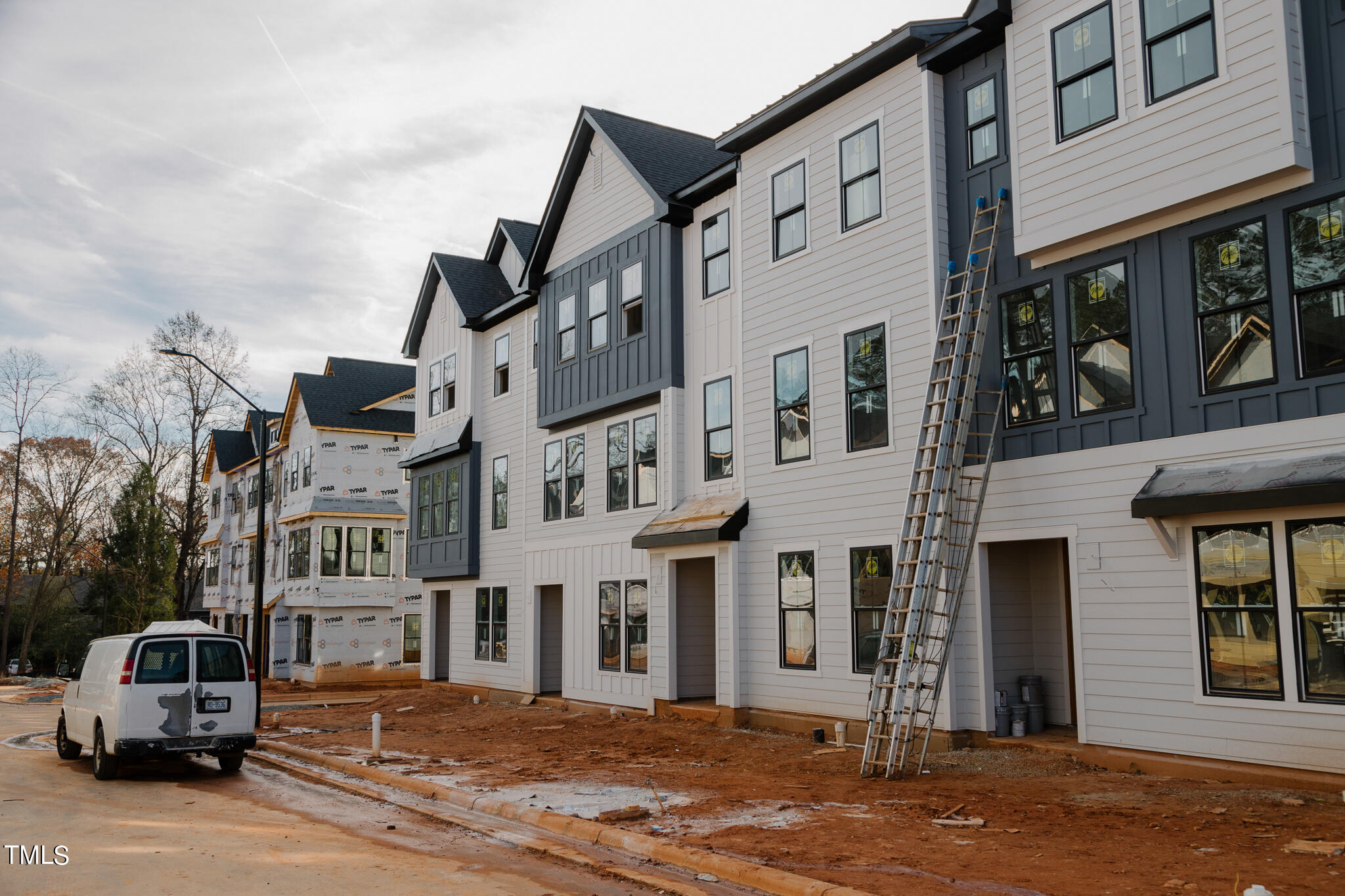 6403 Tanner Oak Lane Raleigh, NC 27613 - Photo 12 of 35 a car parked on the side of a street