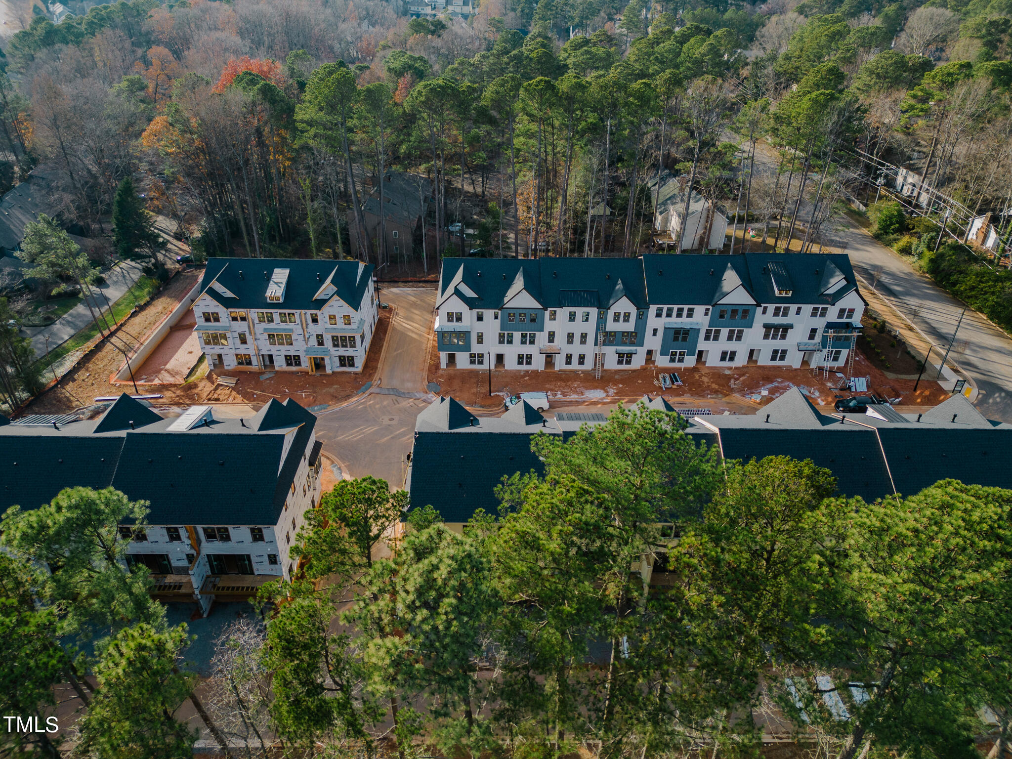 6403 Tanner Oak Lane Raleigh, NC 27613 - Photo 17 of 35 an outdoor sitting area with a table and chairs