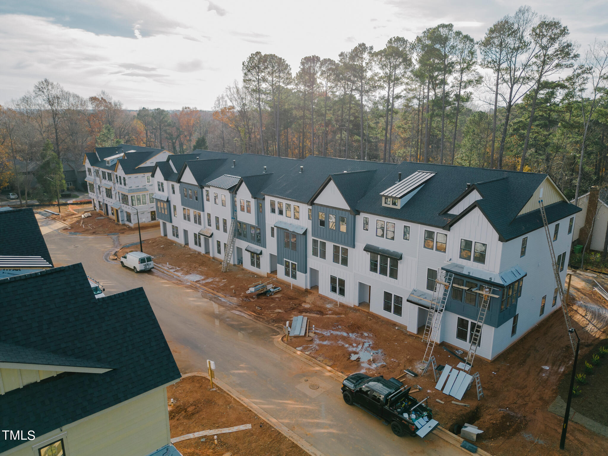 6403 Tanner Oak Lane Raleigh, NC 27613 - Photo 2 of 35 an aerial view of a house with a yard